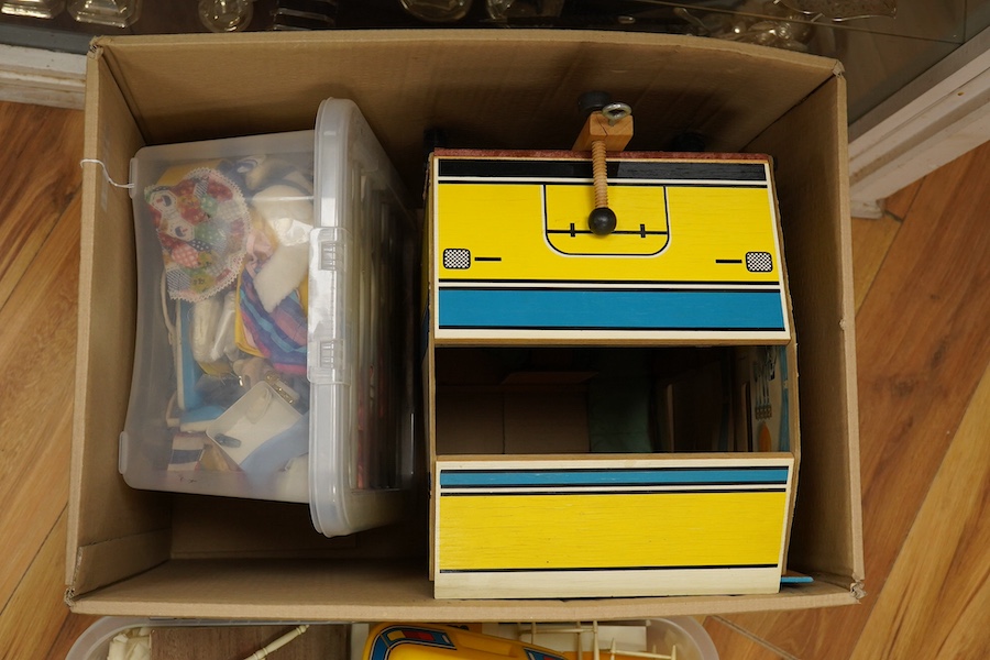 A collection of 1960s-80s Sindy dolls and accessories, including; five dolls, an early plywood and hardboard caravan, a large selection of clothing and accessories, furniture, house fittings, including a shower, wardrobe